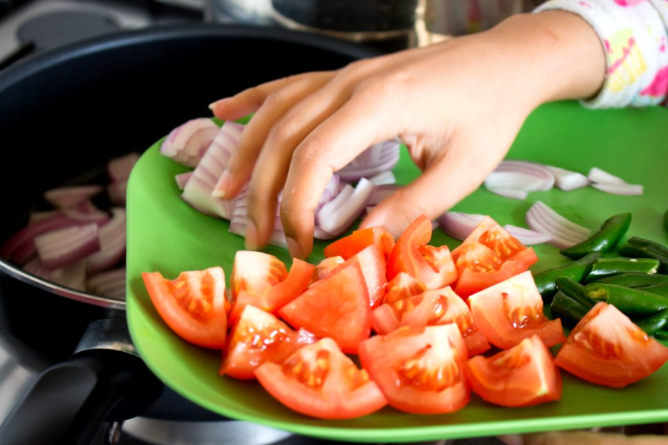 Person Holding Tomato
