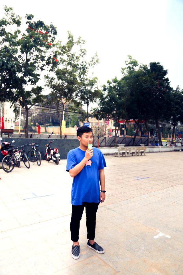 Man Wearing Blue Shirt And Black Pants photo