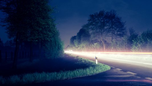 Time Lapse Photograph Of Gray Road Near Trees