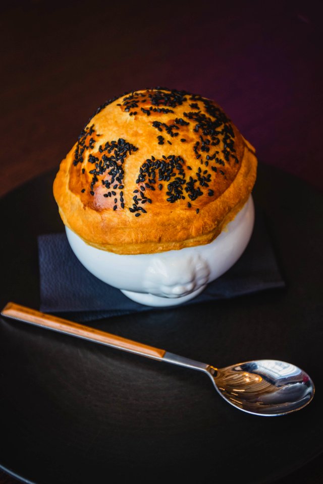 Pastry On White Cup Beside Silver Spoon