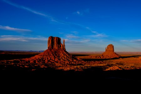 Photography Of Rock Formations Under Blue Skies photo