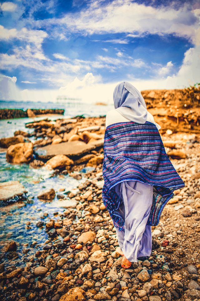 Person Standing On Seashore