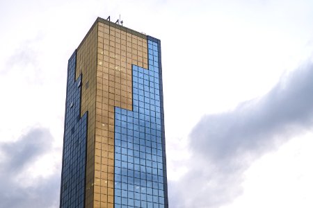 Brown And Blue High-rise Building
