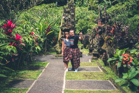 Woman And Man Standing Together And Looking On Flower Garden
