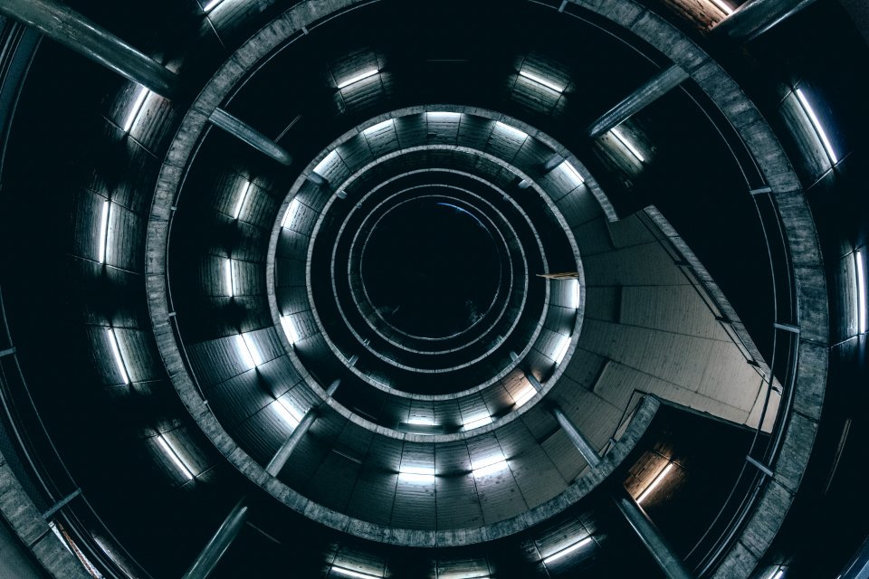 Low Angle Photo Of Spiral Ladder