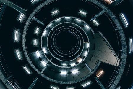 Low Angle Photo Of Spiral Ladder