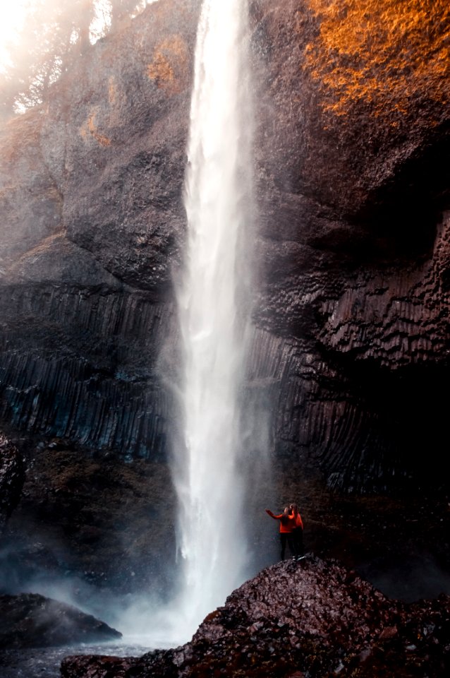 Two Man Beside Waterfall Taken At Daytime