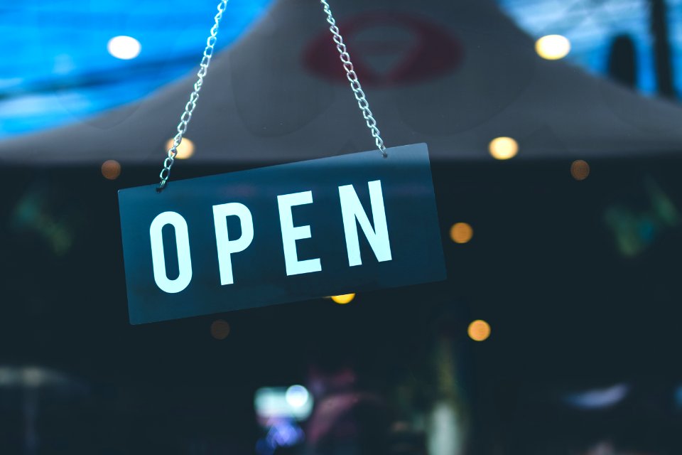 Selective Focus Photography Of Open Signage