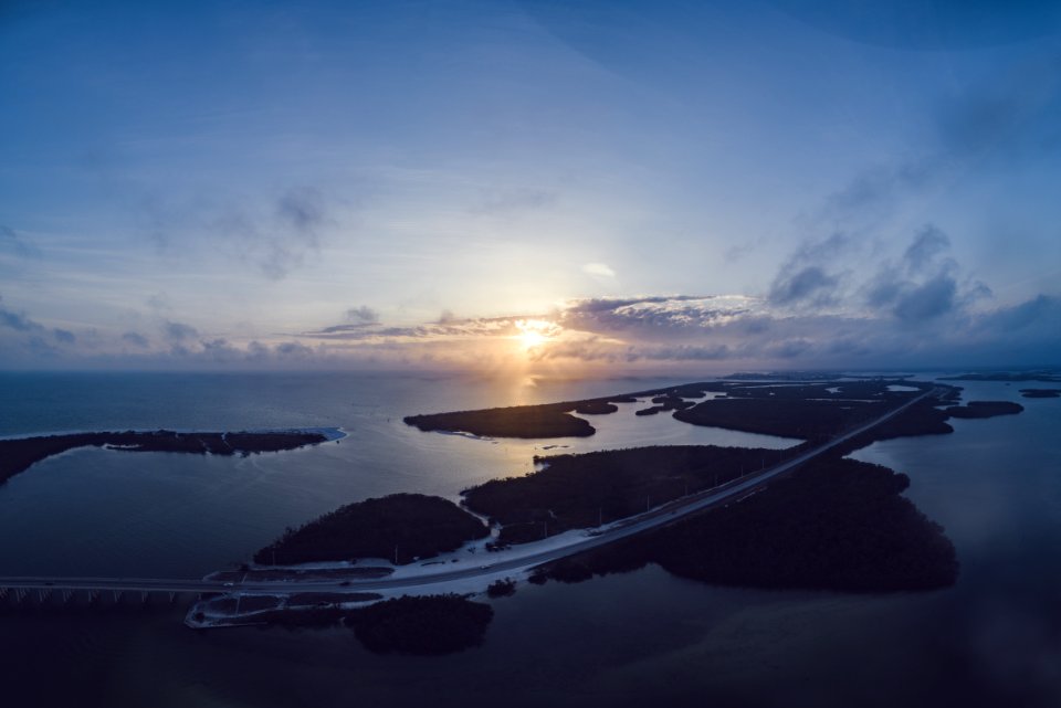 Aerial Photography Of Island During Sunset