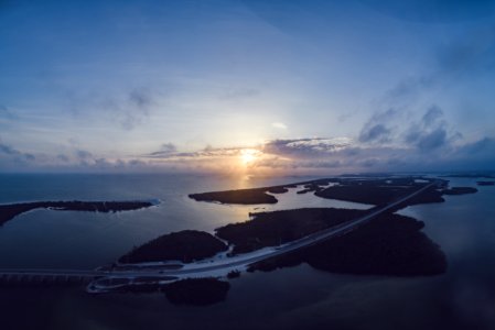 Aerial Photography Of Island During Sunset photo