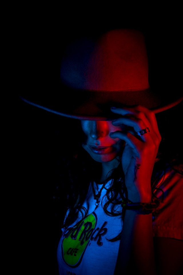 Woman In Gray Hat And White Crew-neck Shirt