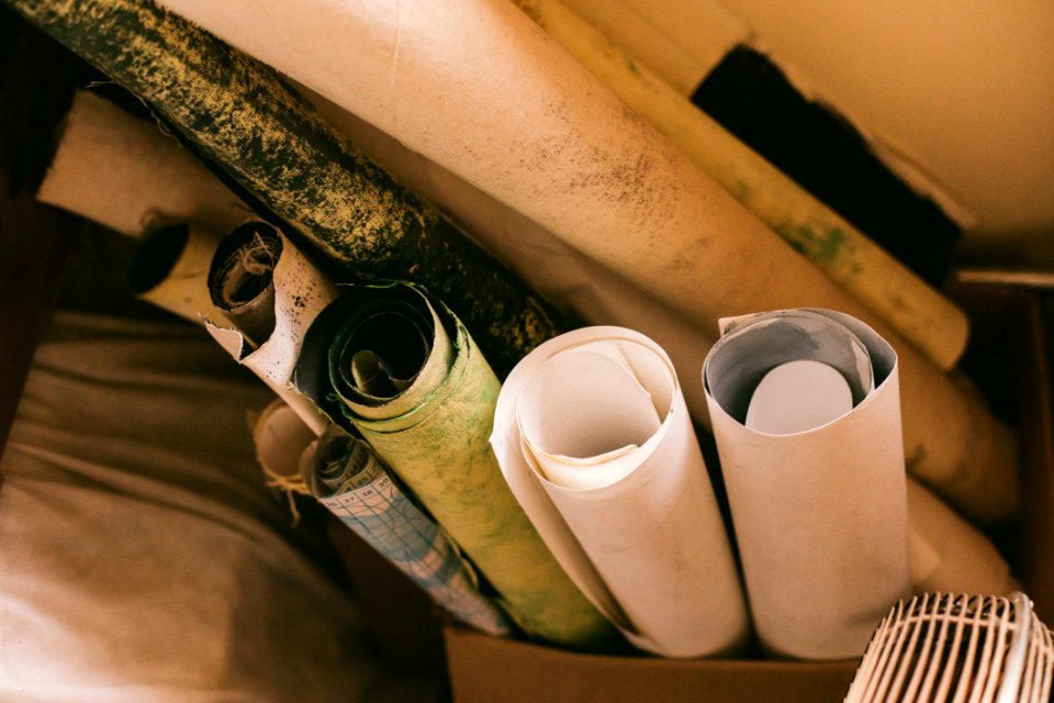 Assorted-color Rolled Paper Beside White Textile