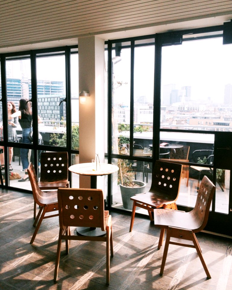 Empty Brown Table With Four Chairs Set