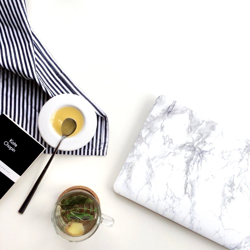 Clear Glass Cup With Tea On Table