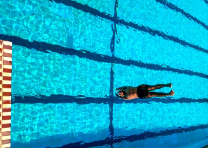 Person Diving On Swimming Pool photo
