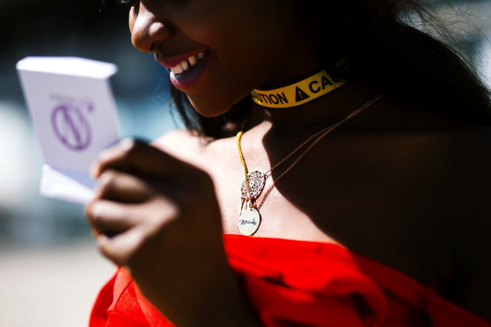 Woman In Red Strapless Dress In Macro Photography