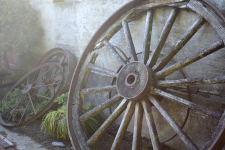 Gray Multi-spoke Wheel Leaning On Wall