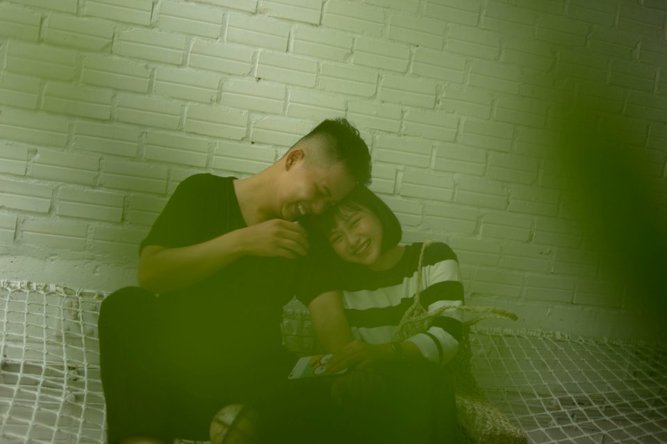 Man And Woman Laughing Together