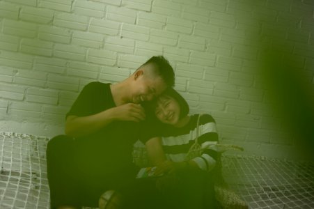 Man And Woman Laughing Together