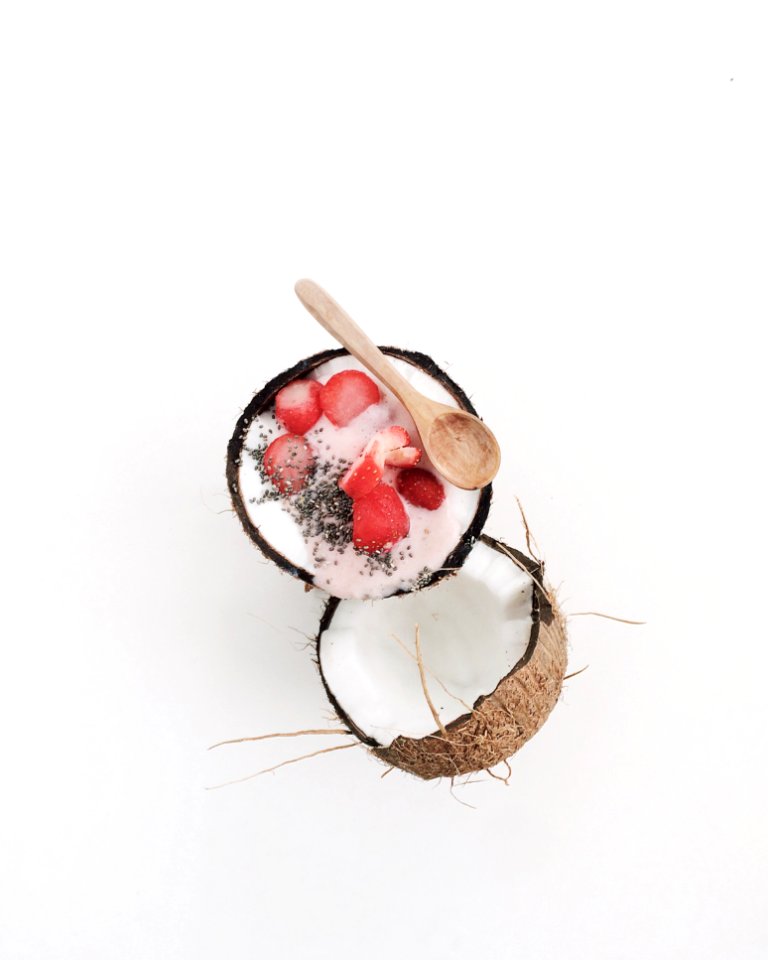 Coconut Filled With Slice Of Fruits