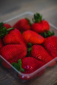Strawberries On Clear Plastic Container photo