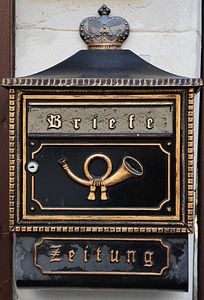 Letter boxes post horn newspaper