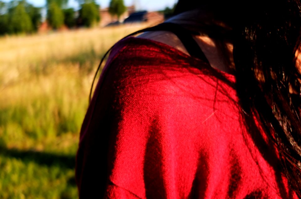 Red Grass Black Hair Close Up