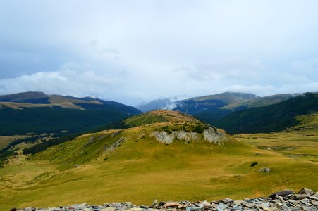Highland Mountainous Landforms Grassland Sky photo