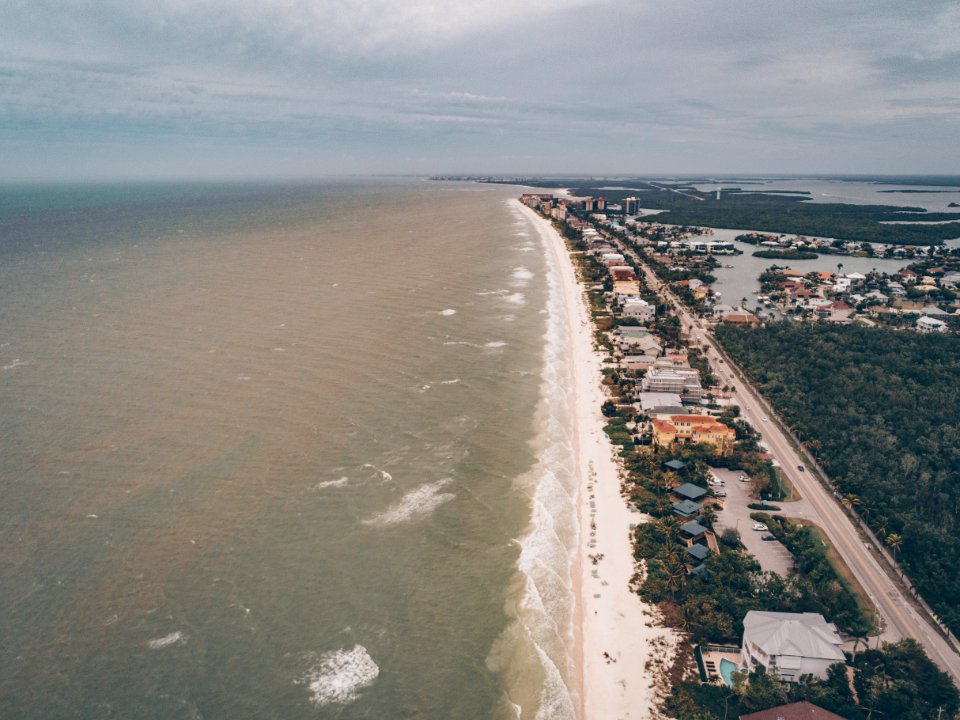 High Angle Photography Of Body Of Water And Landscape
