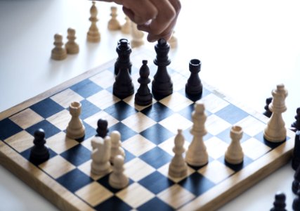 White And Black Chessboard With Pieces