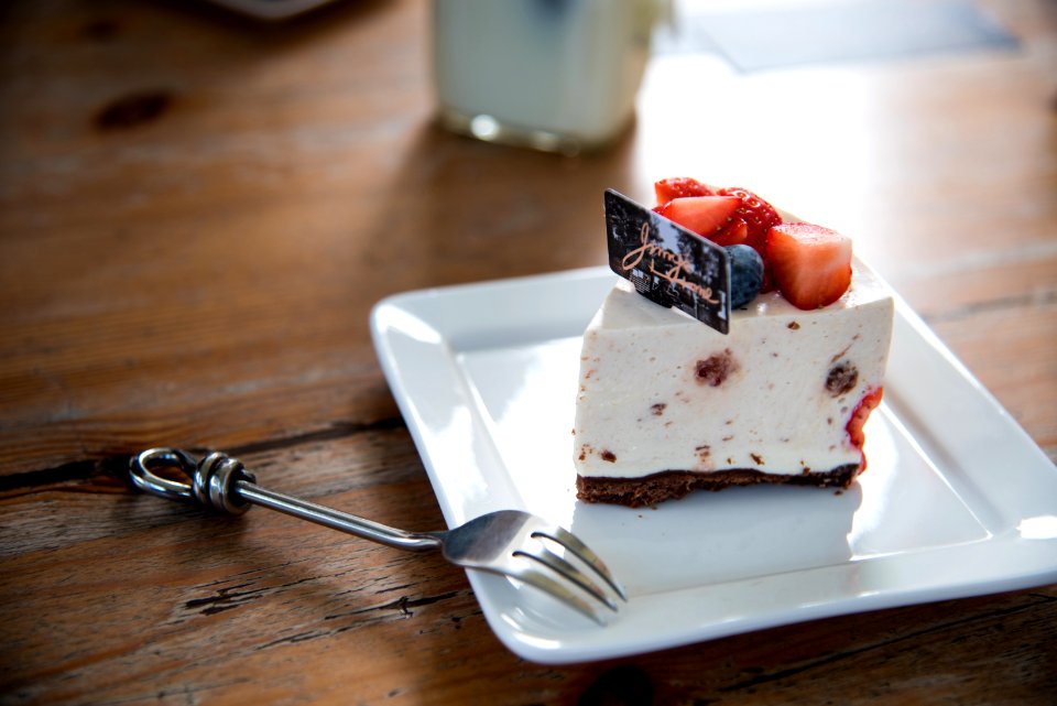 Sliced Of Cake On White Ceramic Plate