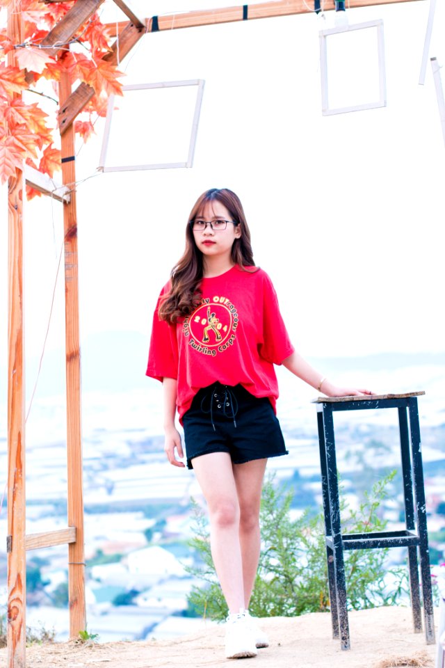Woman Wearing Pink Scoop-neck Top And Black Shorts