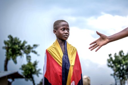 Person Wearing Red And Yellow Textile