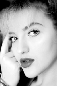Grayscale Photography Of Woman Wearing Lipstick photo