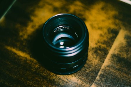 Black Camera Lens On Brown