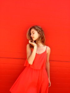 Woman Wearing Orange Spaghetti-strap Dress photo