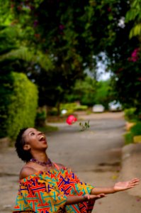 Woman Catching Pink Flwoer