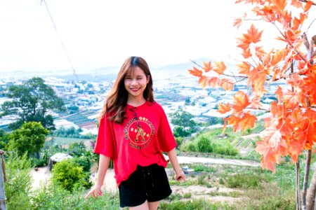 Woman In Red T-shirt And Black Shorts