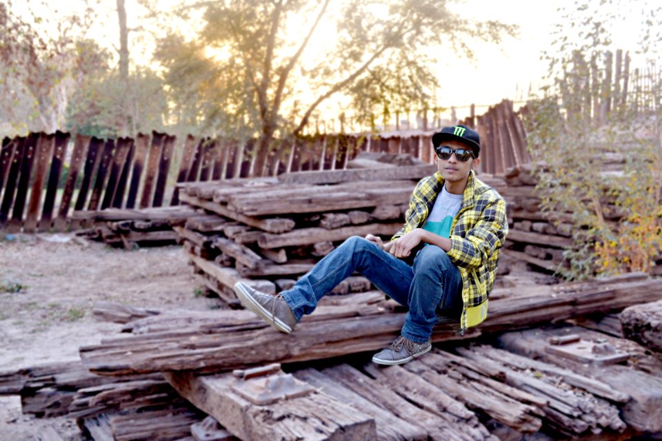 Man In Blue Jeans Posing For Photo
