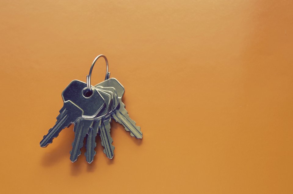 Photography Of Keys On Orange Surface