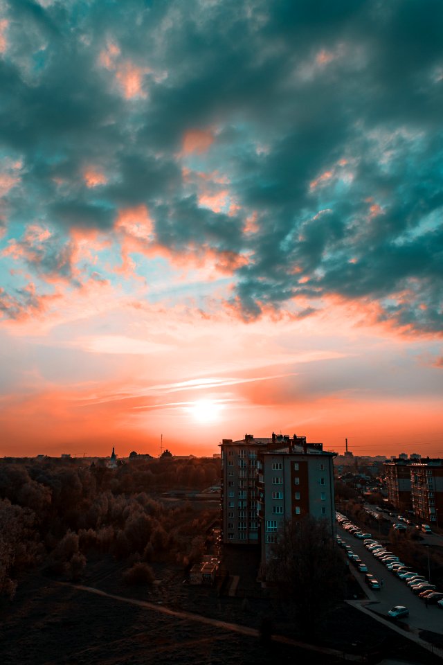 Photography Of Grey Buildings During Sunset