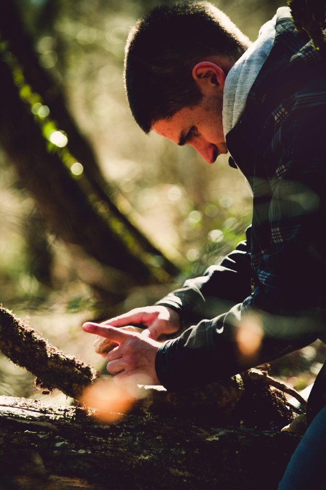 Photo Of Man Looking Down photo