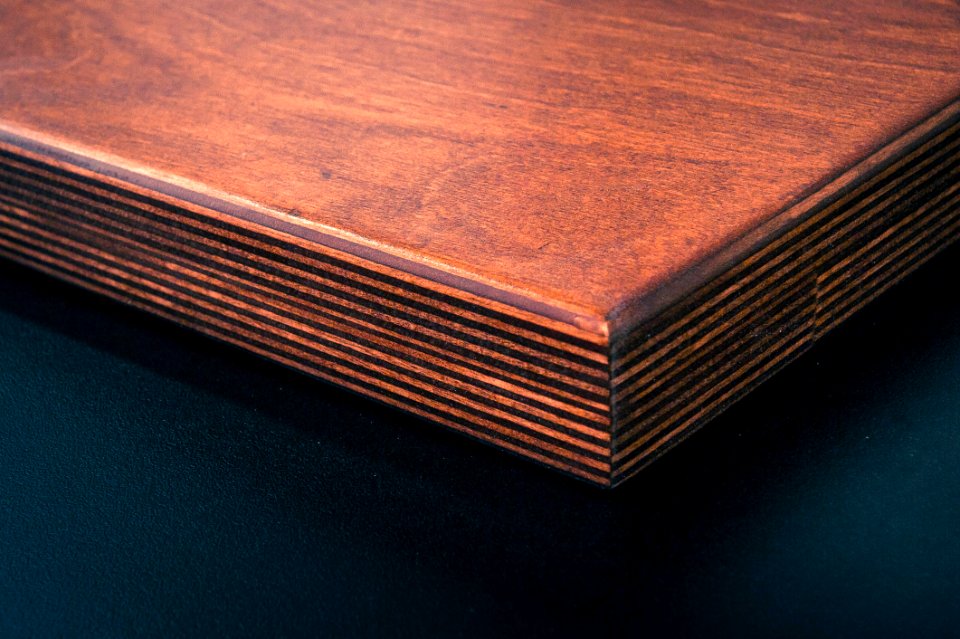 Brown Wooden Board Near Black Surface