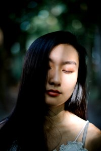 Close-Up Photography Of A Woman With Closed Eyes photo