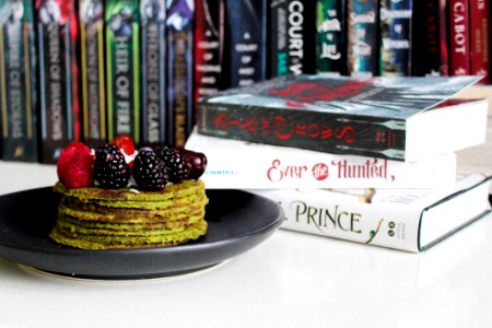 Books Near Cake On Plate photo