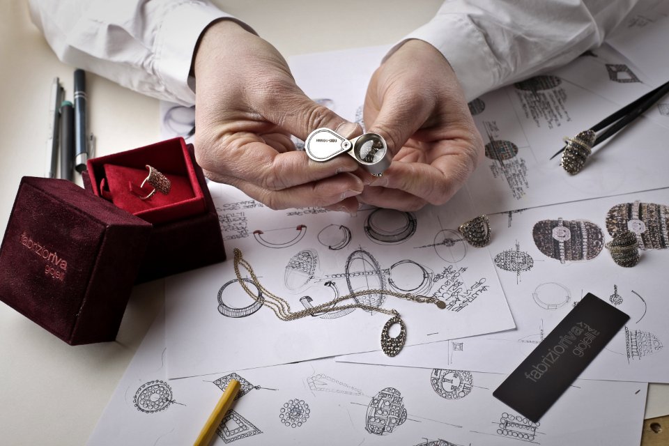 Person Holding Silver-colored Accessory Close-up Photo