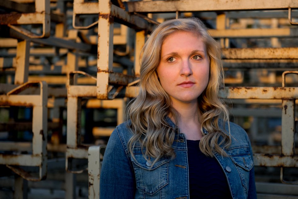 Woman Wearing Blue Denim Jacket