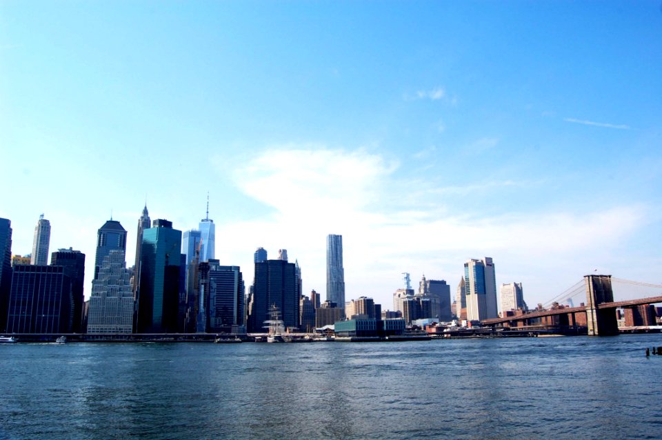 Cityscape Near Body Of Water photo