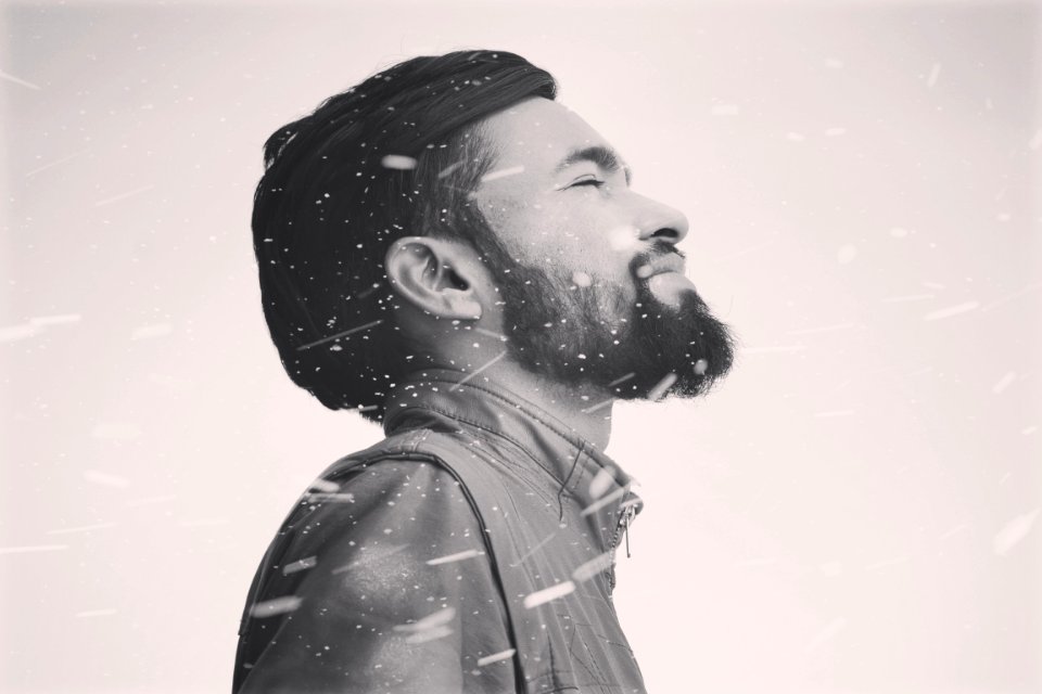 Grayscale Photo Of Man In Zip-up Jacket