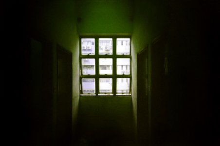 Sun Shine On 6-pane Window In Dark Room photo